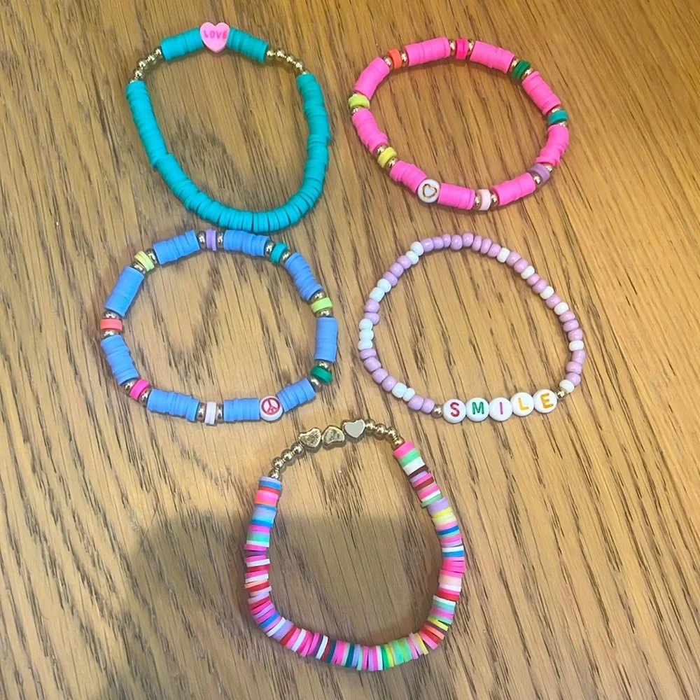 Cheerful set of brightly colored‎ beaded elastic friendship bracelets